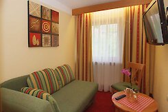 Separates Schlafzimmer in der Suite Suite mit 2 Schlafzimmern in Bodenmais